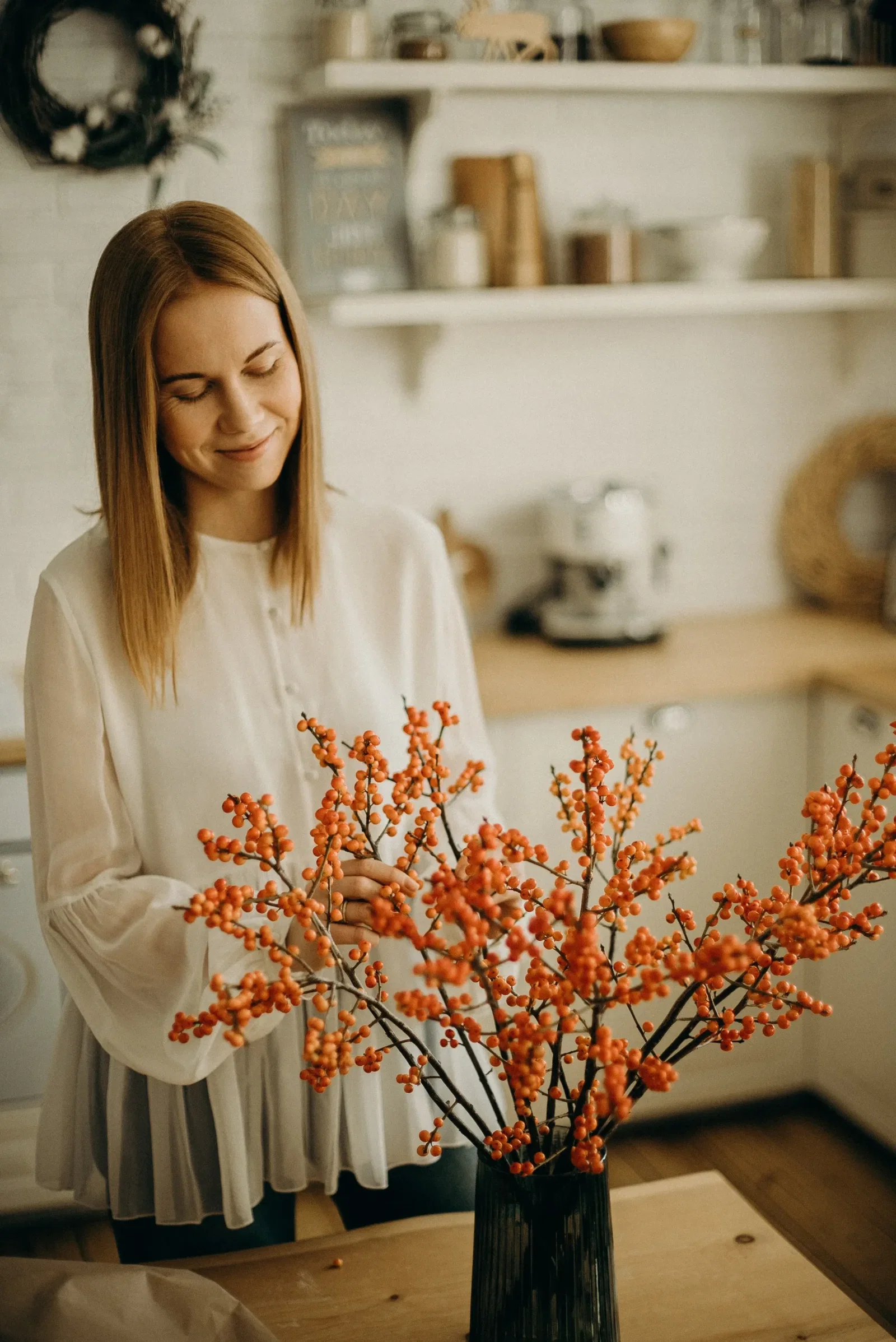 Woman looking at some flowers