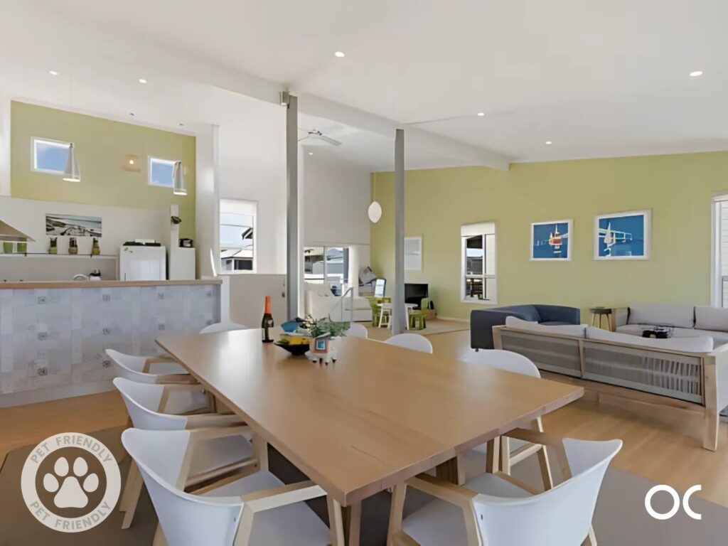 Bright coastal lounge with garden view at pet-friendly holiday rental in Middleton